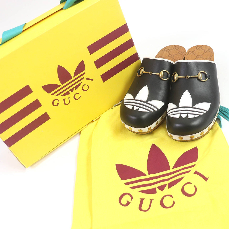 Gucci Sandals 702252 Main: Leather, Wood black Clogs GGPattern sole Gucci x Adidas collaboration logo sandals mens 9
