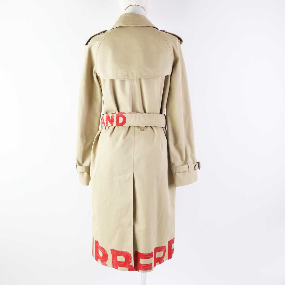 Burberry trench coat 8037621 Outer: 100% cotton, Lining: 100% cotton, Sleeve lining: 100% cupra, Pocket lining: 65% polyester, 35% cotton beige Graffiti Women 36