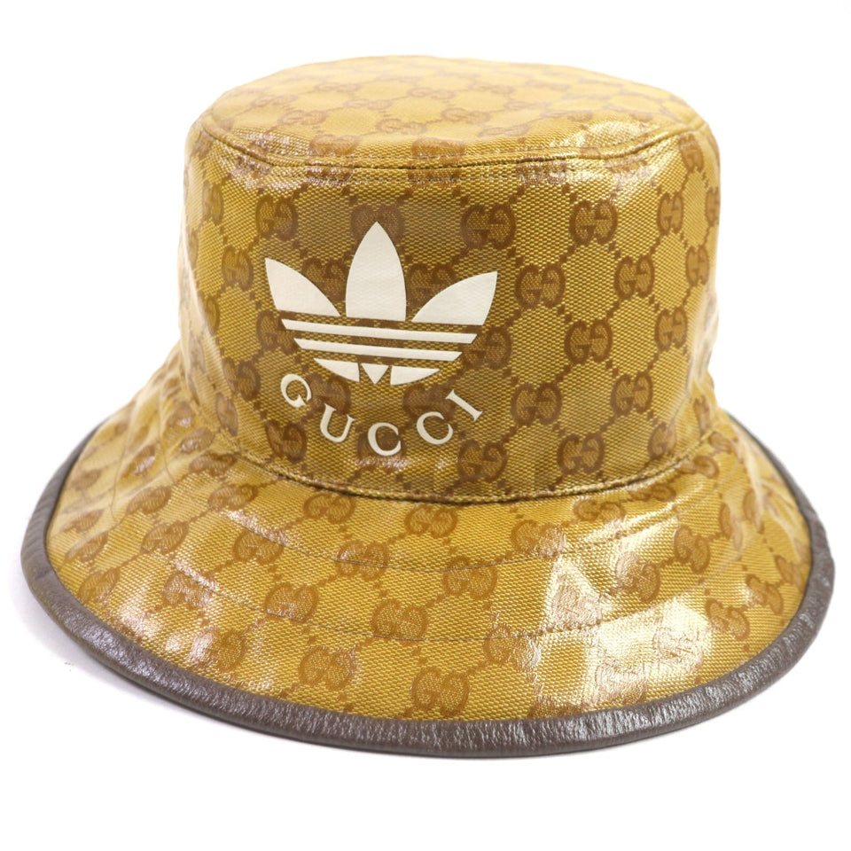 Gucci hat 696484 Outer: 67% nylon, Outer: 33% cotton, Lining: 65% cotton, Lining: 35% linen, Part: leather, Inner: 55% cotton, 45% rayon Brown type mens