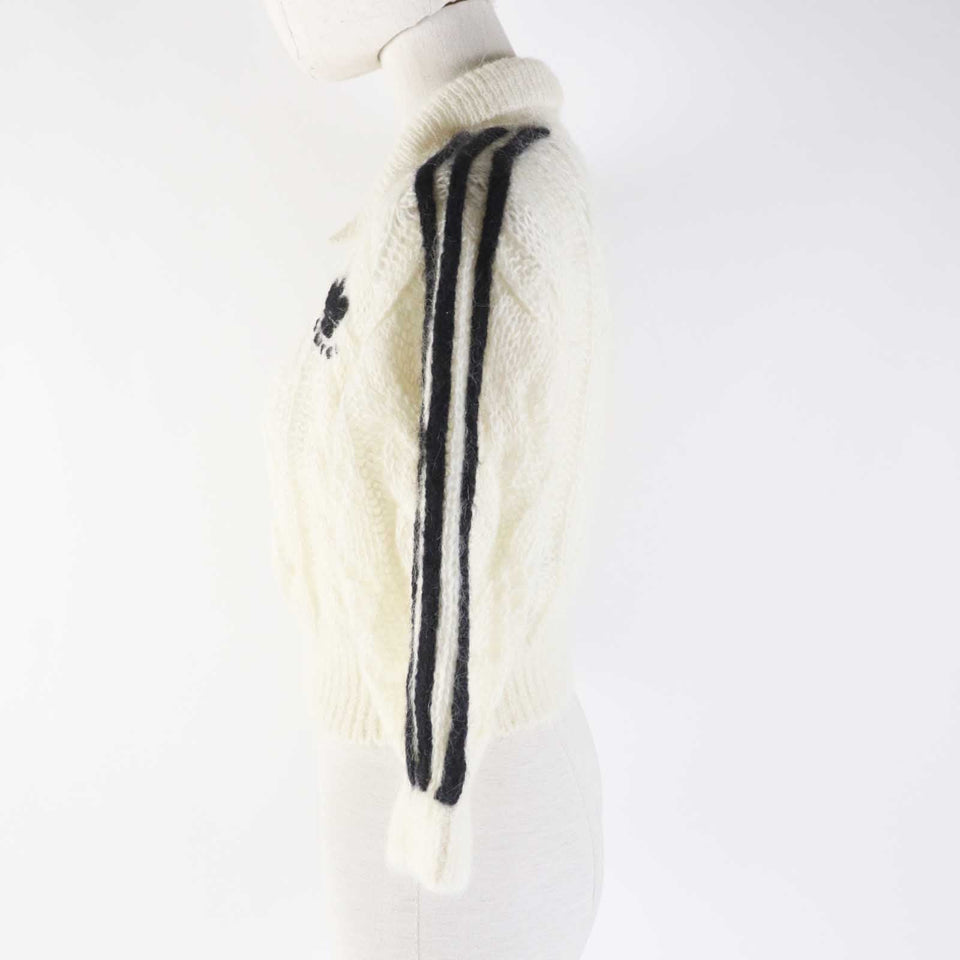 Gucci knit 713023 Outer: 67% mohair, Outer: 28% nylon, Outer: 5% wool, Part: 63% mohair, Part: 29% nylon, : 7% wool, 3% polyurethane Embroidery: 67% mohair, 28% nylon, 5% wool Inner: 75% acetate, 25% silk white Women XS