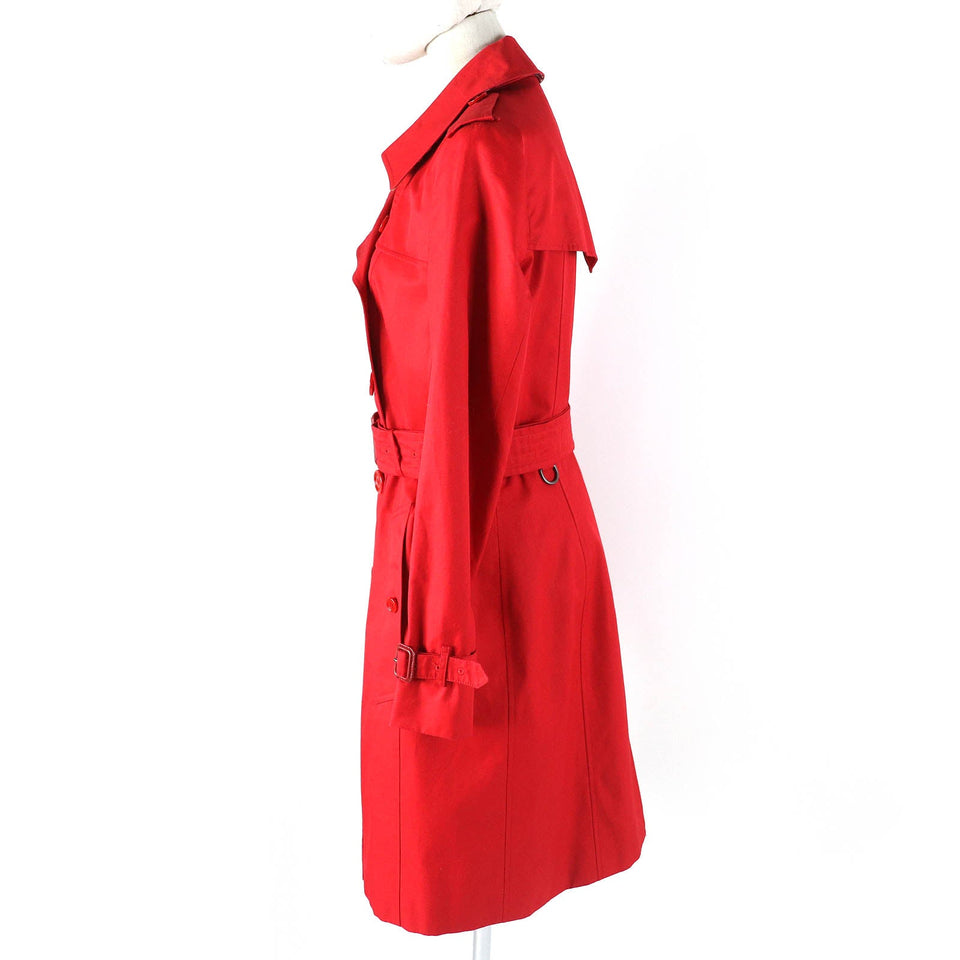 Burberry trench coat Outer: 100% cotton, Lining: 100% cotton, Sleeve lining: 100% viscose (rayon) Red Women 40