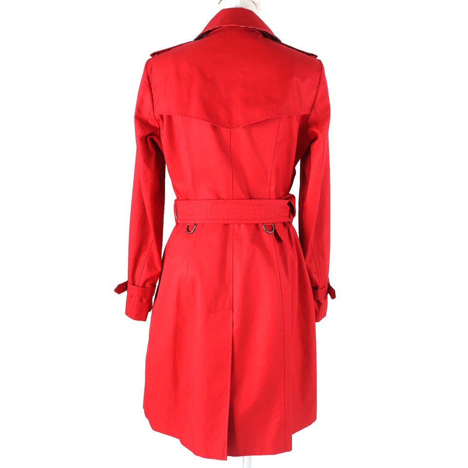 Burberry trench coat Outer: 100% cotton, Lining: 100% cotton, Sleeve lining: 100% viscose (rayon) Red Women 40