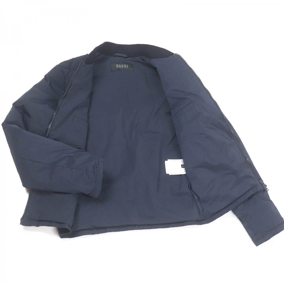 Gucci Down jacket 322555 Main: 92% nylon, Main: 8% polyurethane, Part: 98% wool, Part: 2% polyurethane, Filling: 100% down Navy mens 44