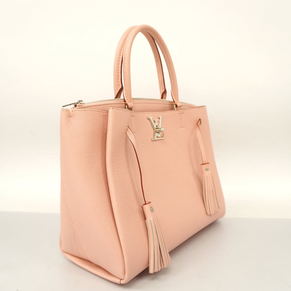 Louis Vuitton LockMe Rose Poodle Shoulder Bag