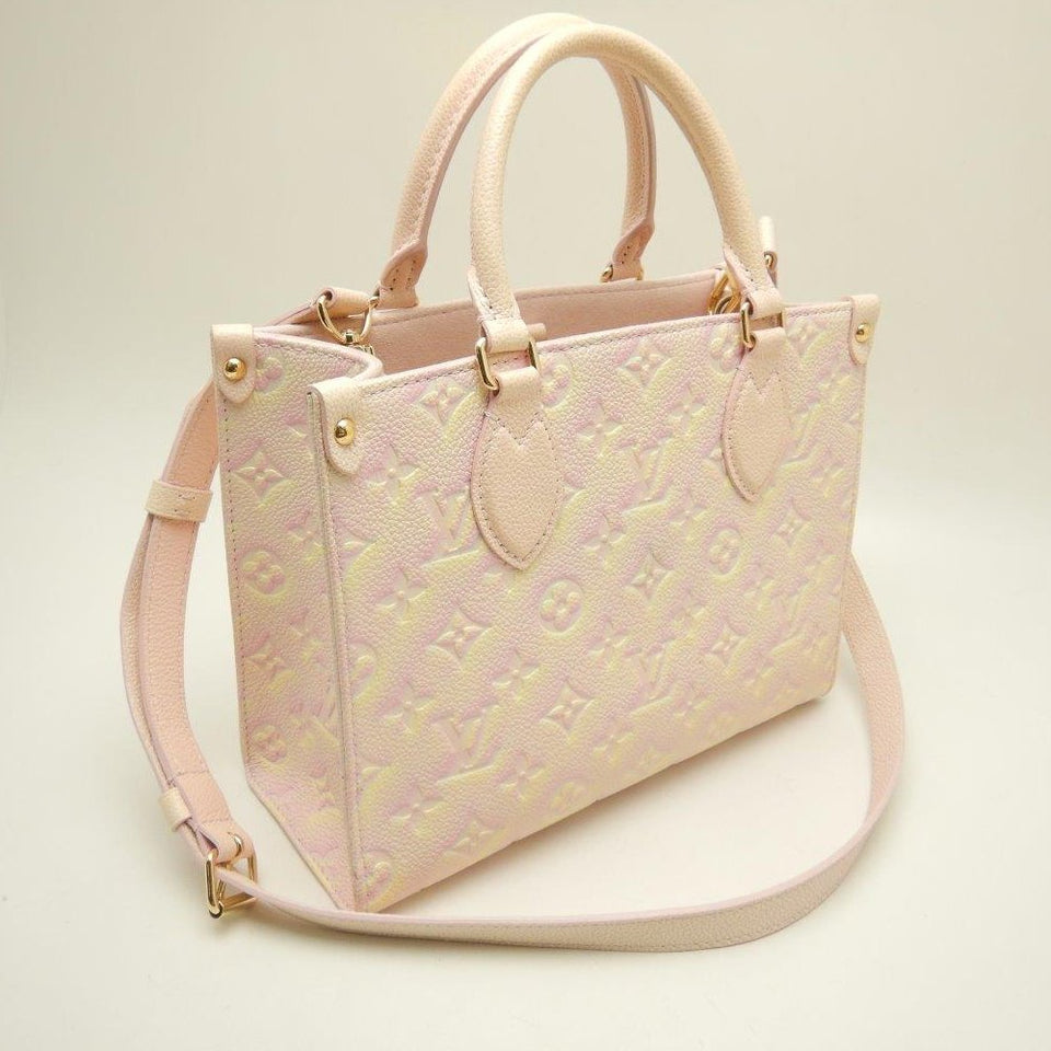 Louis Vuitton On The Go PM Emplant Handbag Light Pink