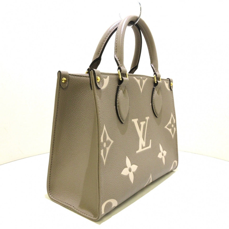 Louis Vuitton On The Go PM Handbag Tourtrail Creme Embossed