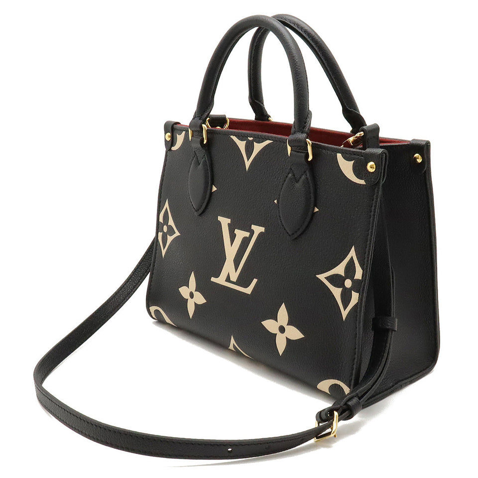 Louis Vuitton Monogram Implant On The Go PM Handbag