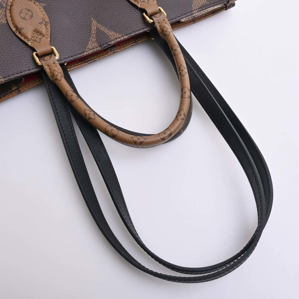 Louis Vuitton Monogram Giant Reverse On the Go MM Handbag Brown Women's