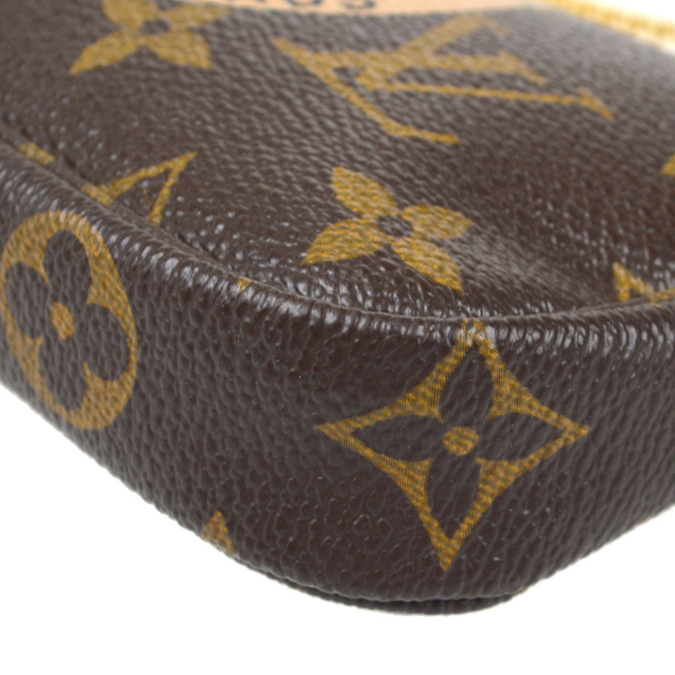 Louis Vuitton 2007 T&B Mini Pochette Accessoires Monogram Clutch