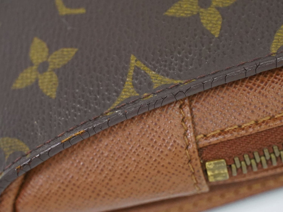 Louis Vuitton Orsay Monogram Clutch Bag