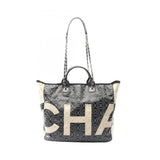 Chanel Coco Mark Camellia PVC Coated Canvas Tote Bag