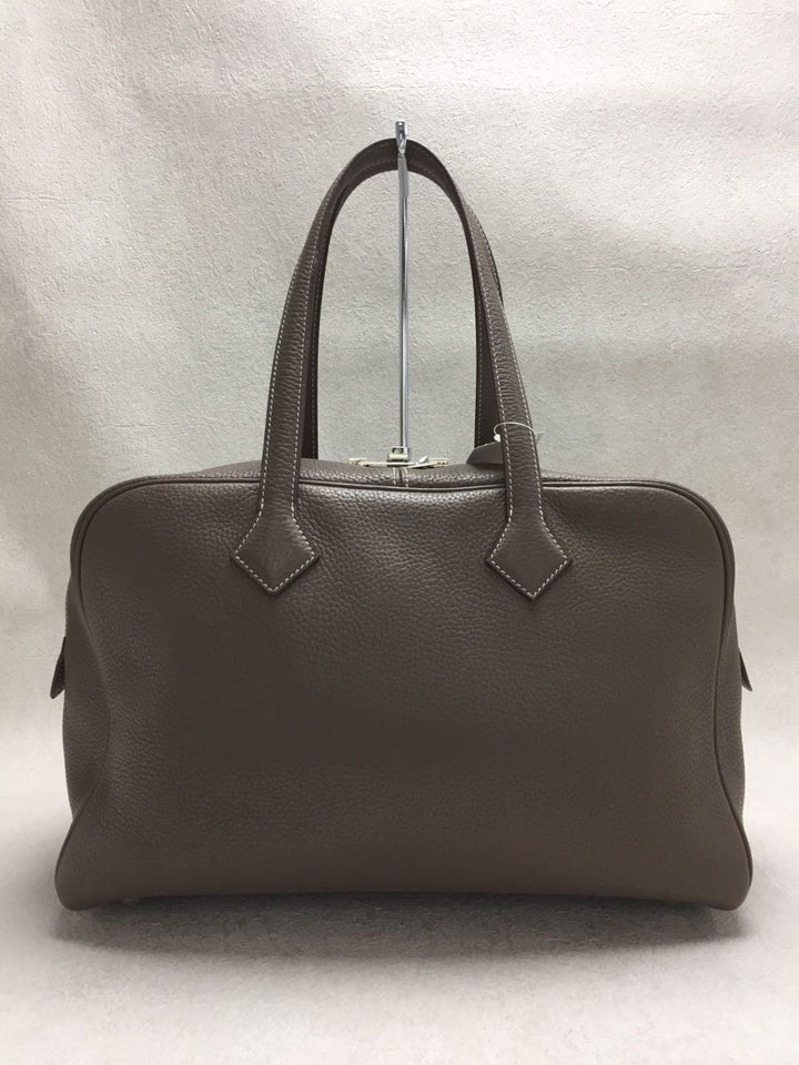Hermes Victoria Leather Tourillon Clemence Handbag