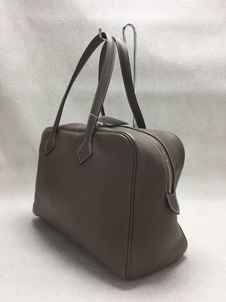 Hermes Victoria Leather Tourillon Clemence Handbag