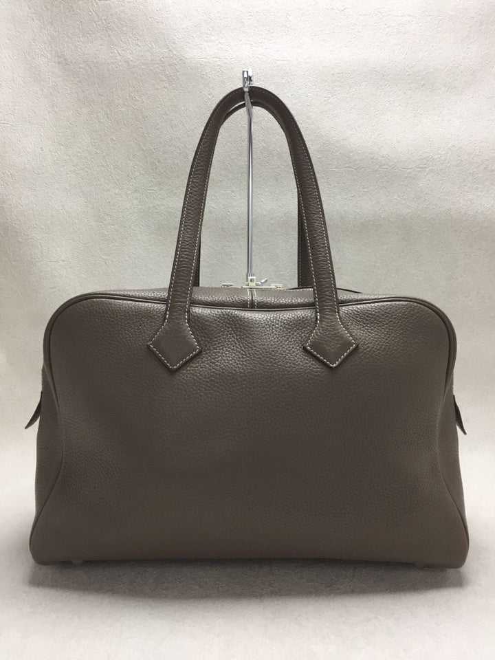 Hermes Victoria Leather Tourillon Clemence Handbag