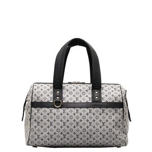 Louis Vuitton Louis Vuitton Monogram Mini Handbag Linen/Leather Naïve