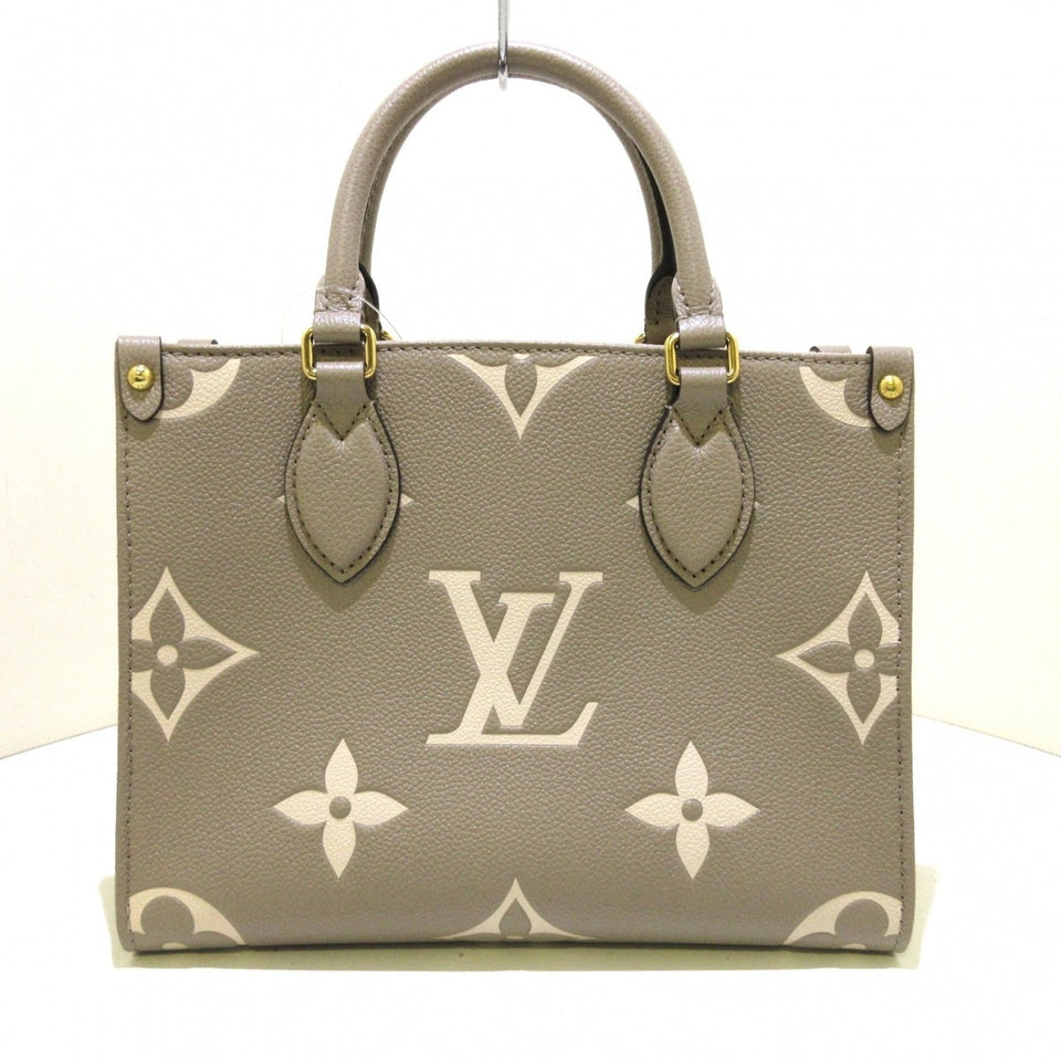 Louis Vuitton On The Go PM Handbag Tourtrail Creme Embossed