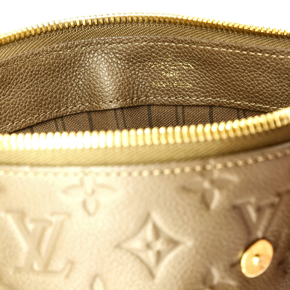 Louis Vuitton Petillante Clutch Monogram Empreinte Leather
