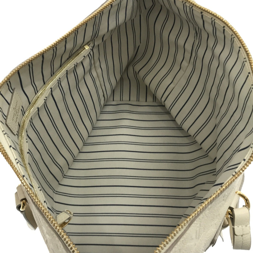Louis Vuitton Lumineuse PM  Monogram Empreinte Leather Handbag