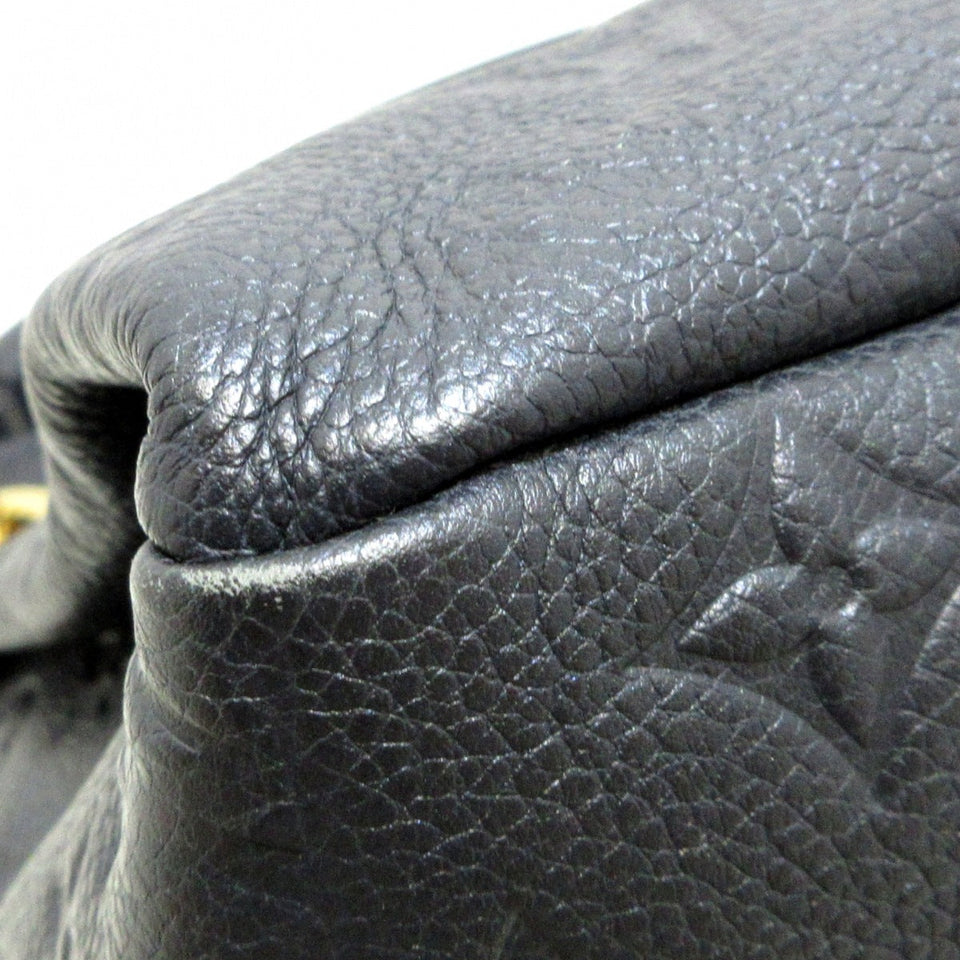 Louis Vuitton Artsy MM Monogram Empreinte Leather Handbag