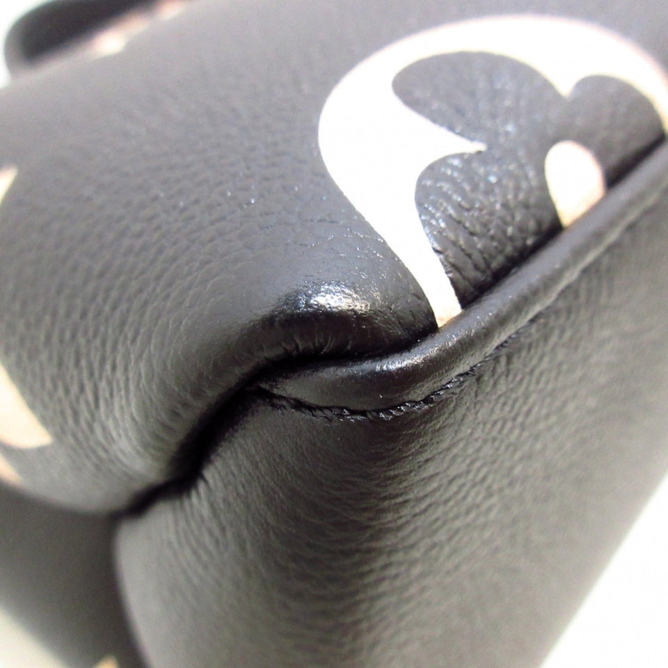 Louis Vuitton Petit Palais PM Monogram Empreinte Leather Handbag