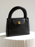 Chanel Vintage 1998 Kelly Black Caviar Leather 24K Gold Top Handle Bag