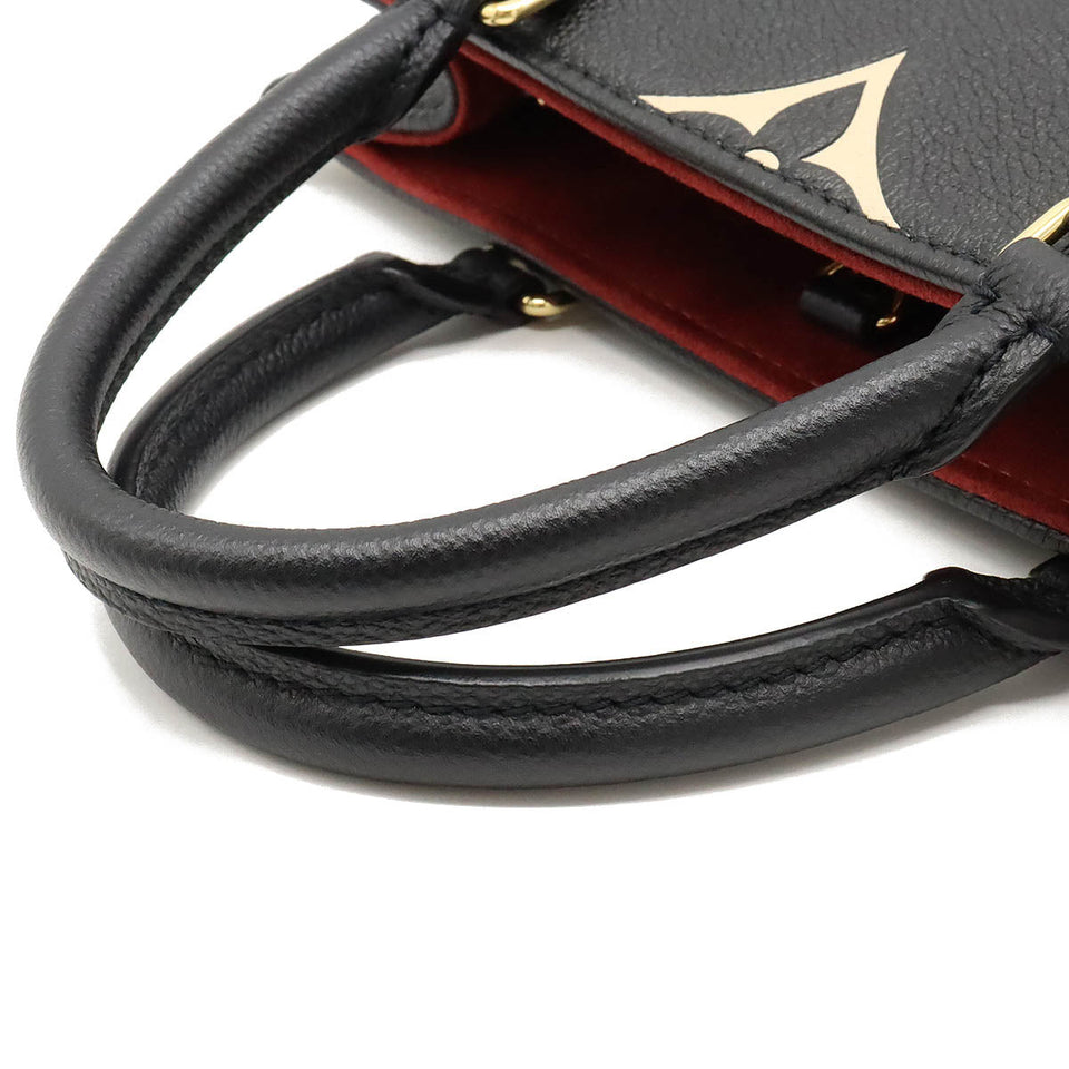 Louis Vuitton Monogram Implant On The Go PM Handbag