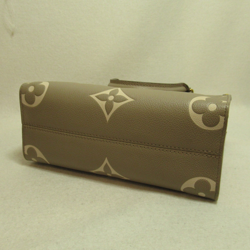 Louis Vuitton On The Go PM Handbag Leather Monogram Implant