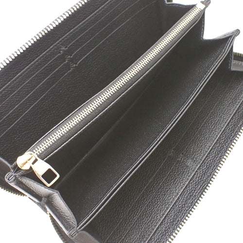 Louis Vuitton Monogram Implant Zippy Wallet