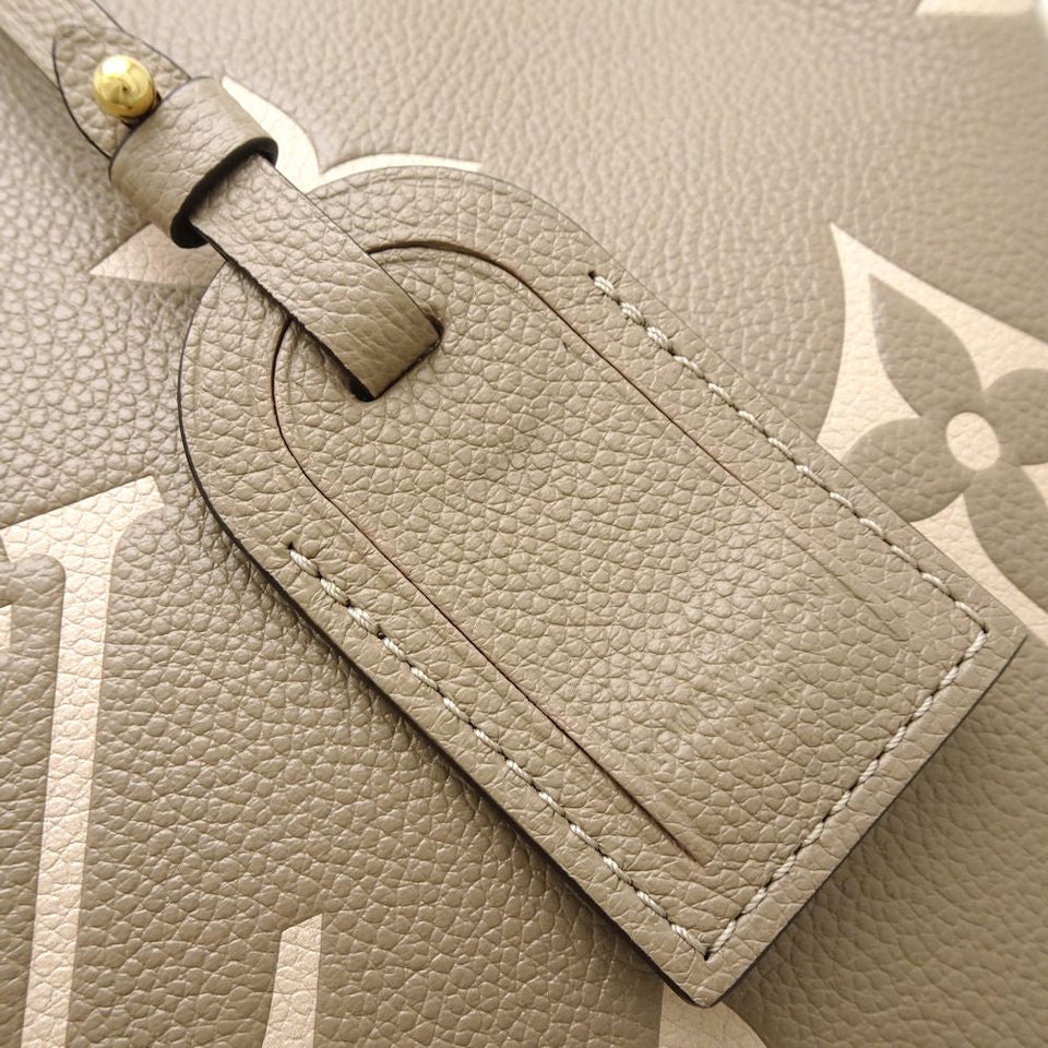 Louis Vuitton Petit Palais PM Bicolor Monogram Implant Handbag Tourtrell Creme