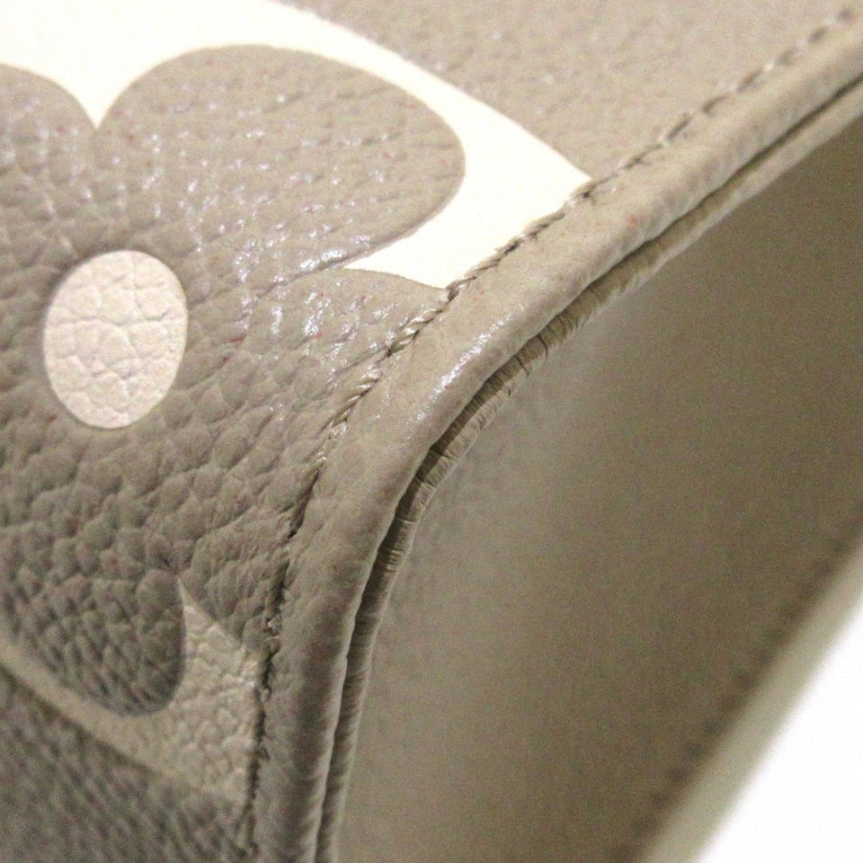 Louis Vuitton On The Go PM Handbag Tourtrail Creme Embossed