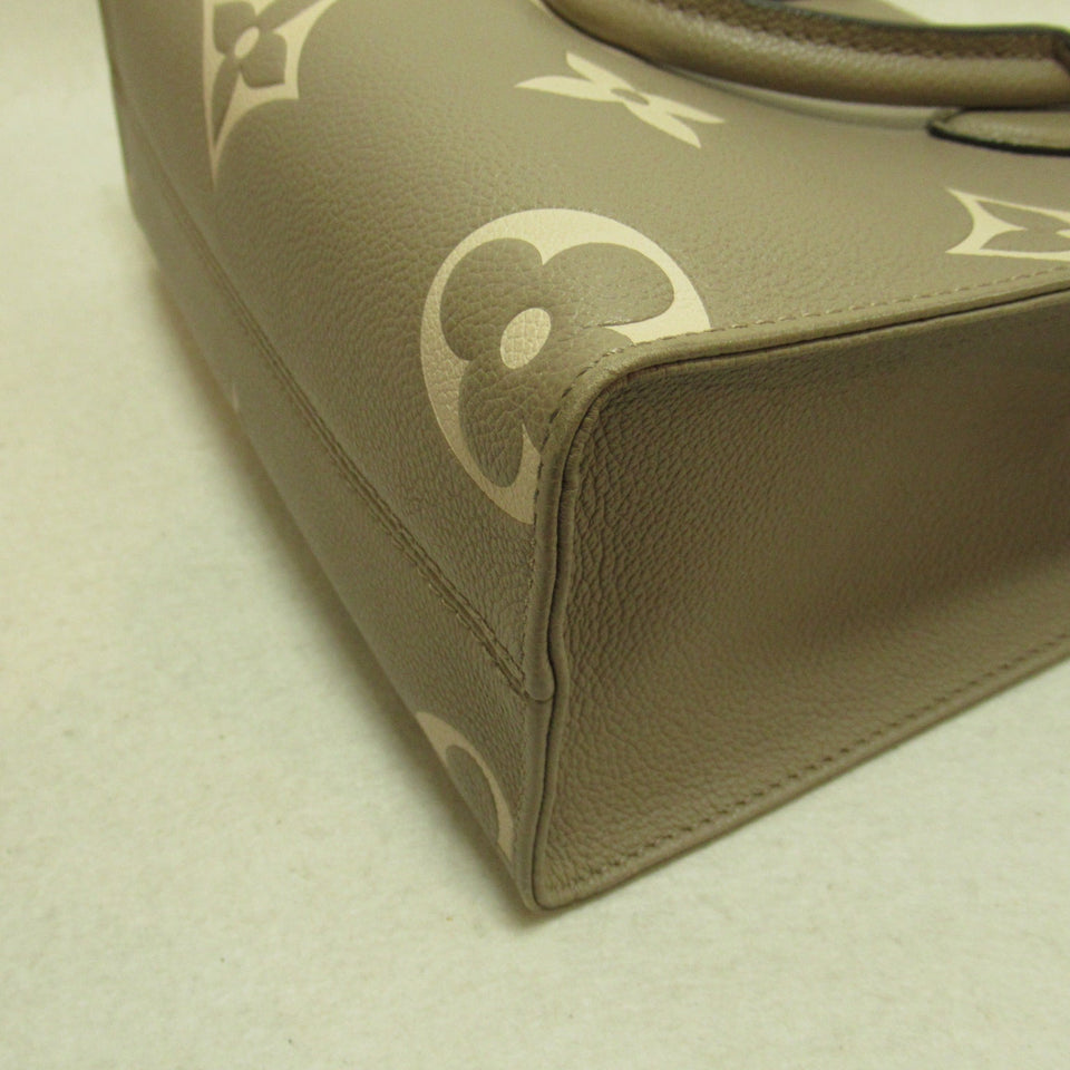 Louis Vuitton On The Go PM Handbag Leather Monogram Implant
