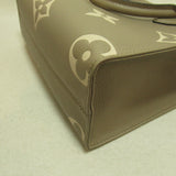 Louis Vuitton On The Go PM Handbag Leather Monogram Implant