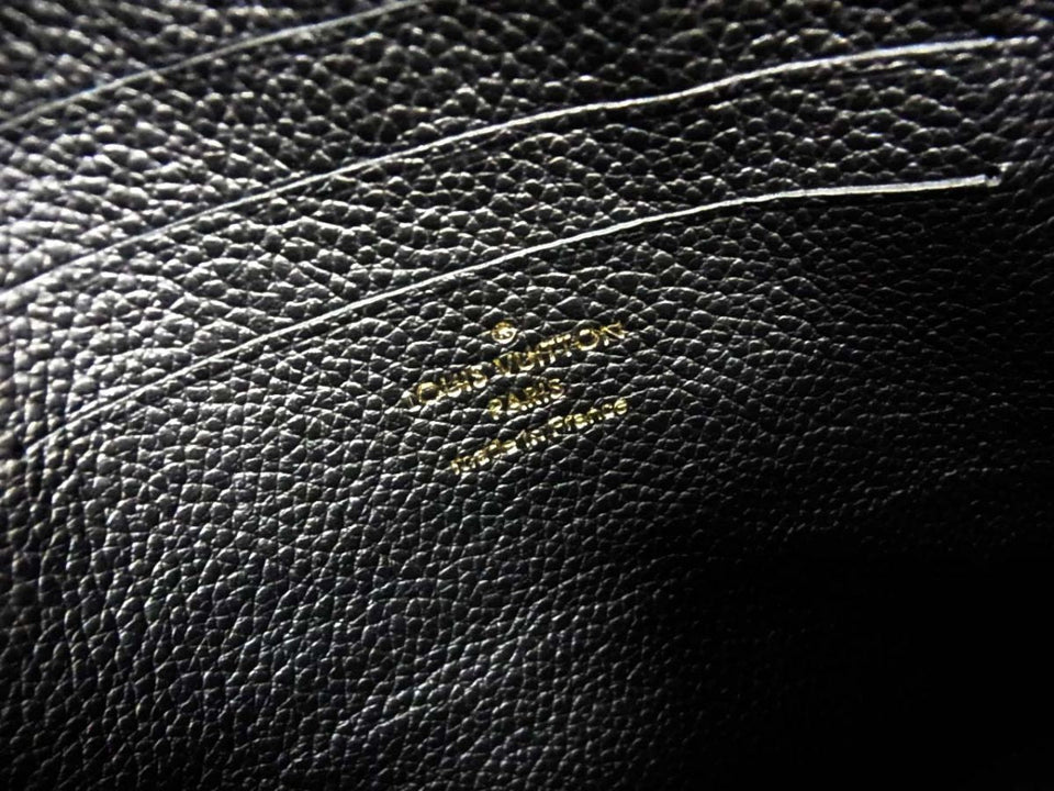 Louis Vuitton Monogram Empreinte Pochette Melanie Clutch Bag