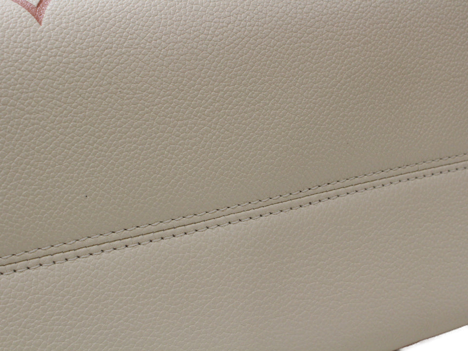 Louis Vuitton On The Go MM Handbag Monogram Implant Creme