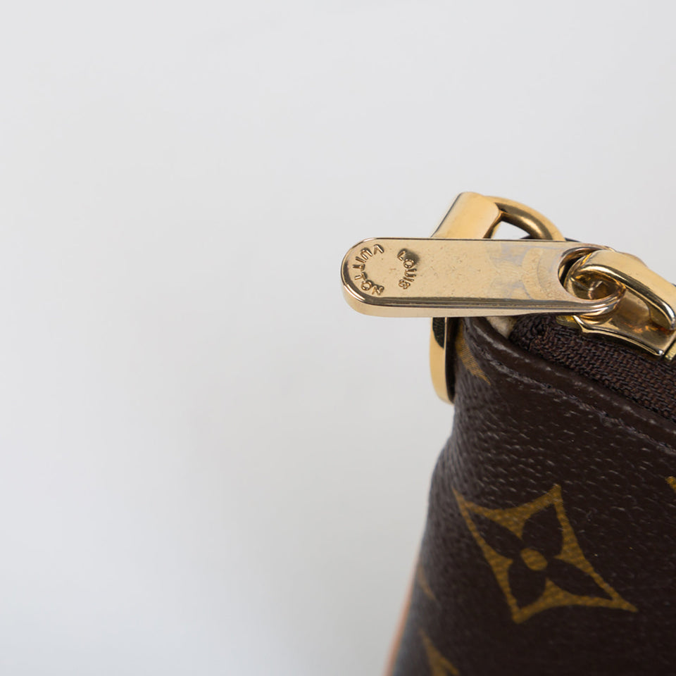 Louis Vuitton Milla Clutch