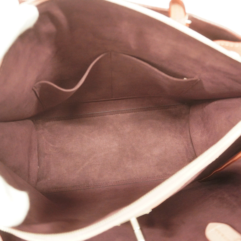 Louis Vuitton LockMe Rose Poodle Shoulder Bag