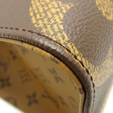 Louis Vuitton Monogram Giant Reverse On The Go MM Brown