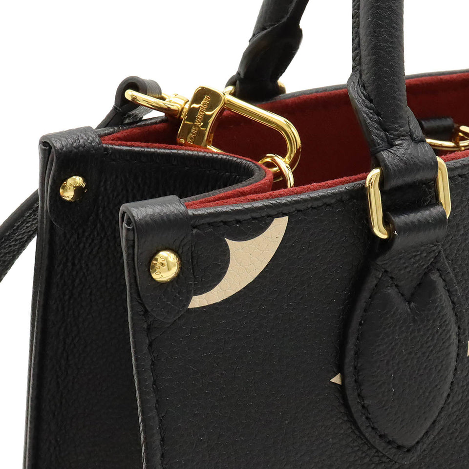 Louis Vuitton Monogram Implant On The Go PM Handbag