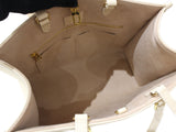 Louis Vuitton On The Go MM Handbag Monogram Implant Creme