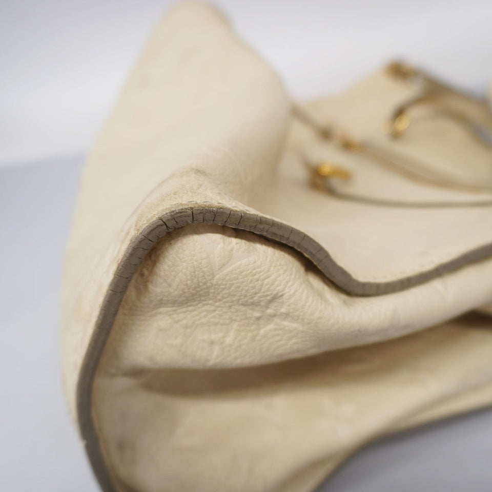 Louis Vuitton Lumineuse PM Empreinte Monogram Emplant Creme