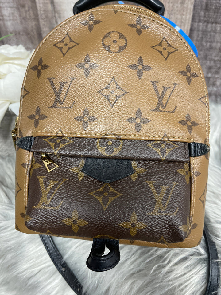 Backpack Luxury Designer By Louis Vuitton Size: Small