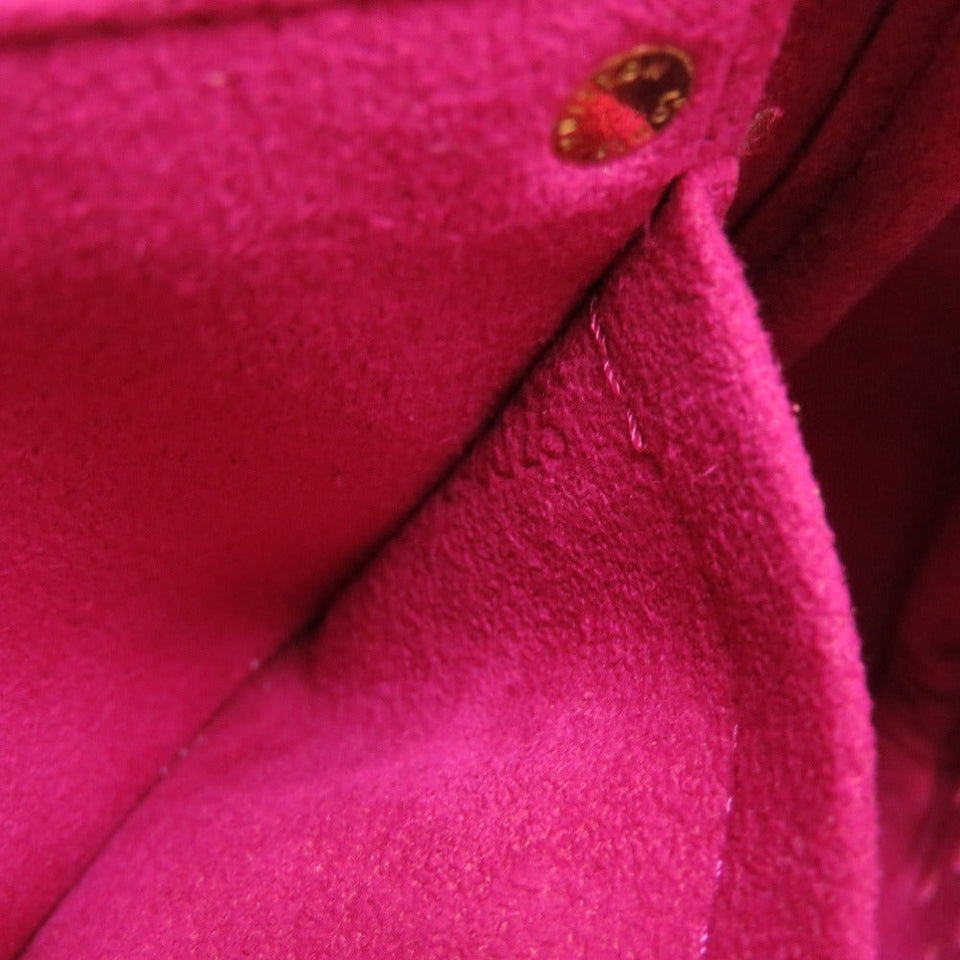 Louis Vuitton Monogram Perfo Pochette Accessoire Fuchsia Handbag