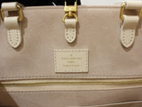 Louis Vuitton On The Go MM Handbag Monogram Implant Creme