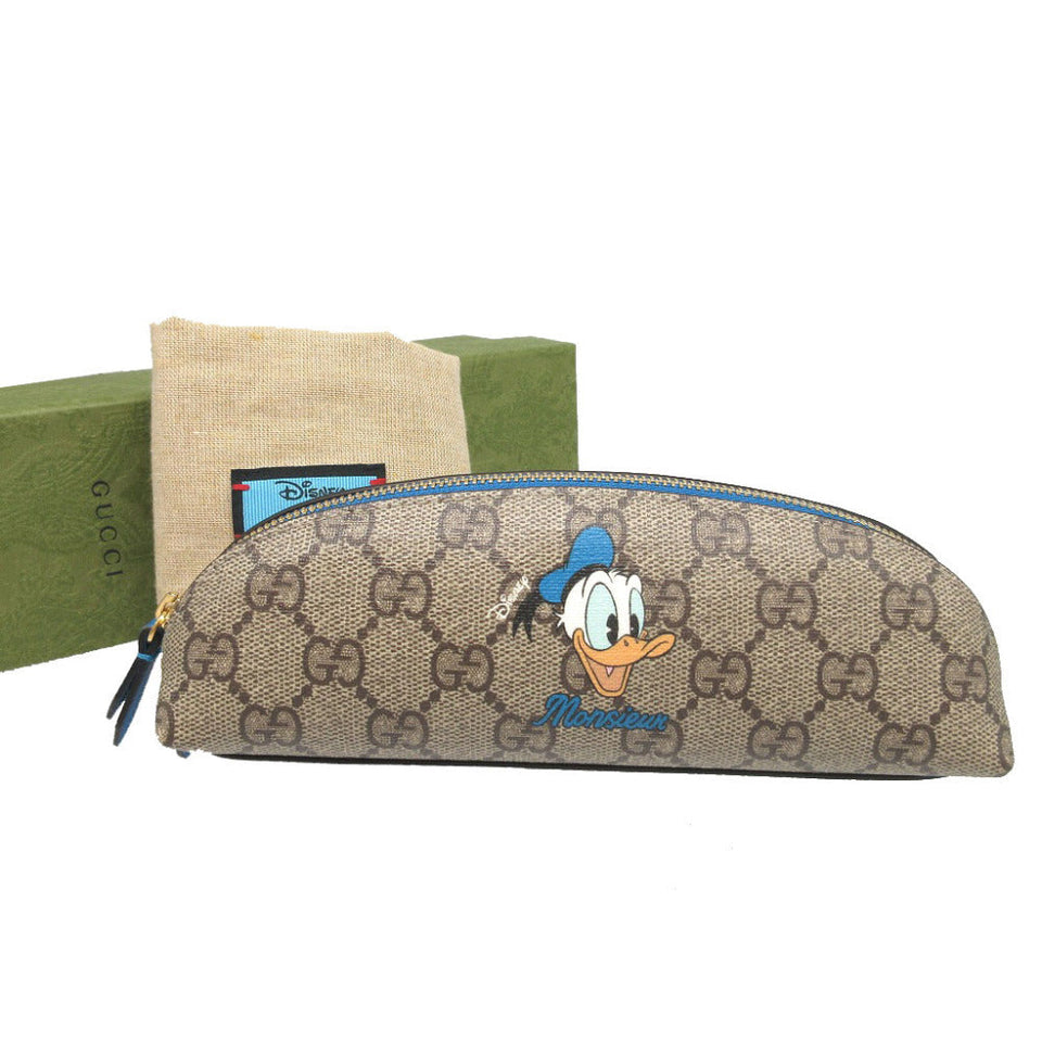 Gucci pencil case 662129 GG Supreme, Leather beige Pencil case Donald Duck Disney collaboration Women