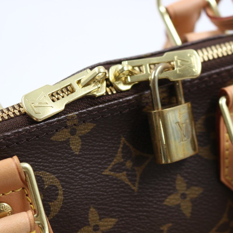 Louis Vuitton Alma PM Monogram Handbag