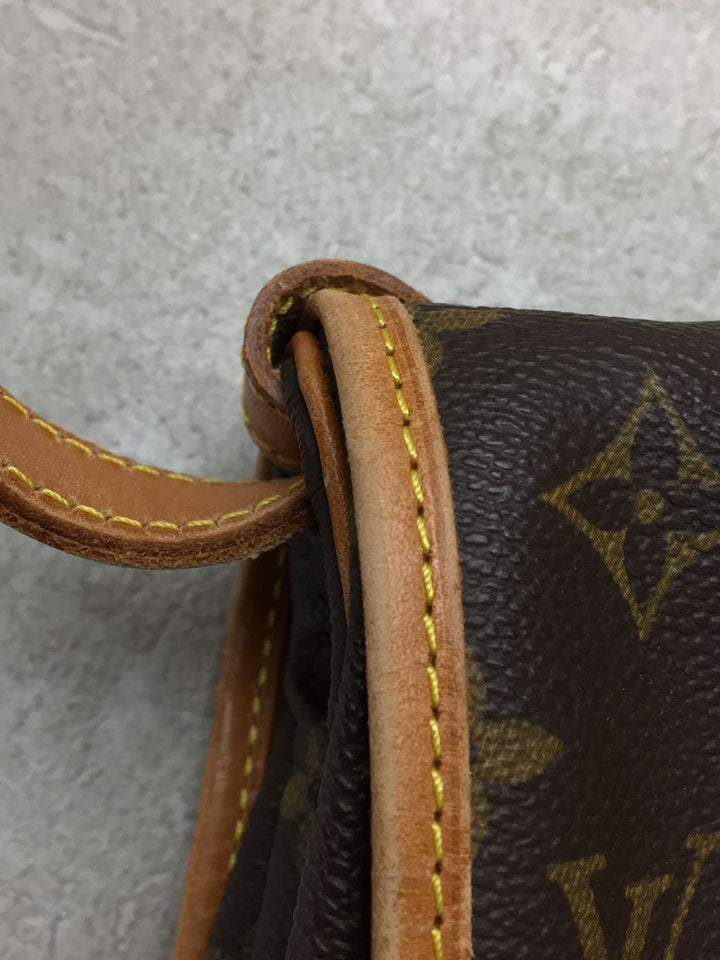 Louis Vuitton Saumur 30 Monogram Brown
