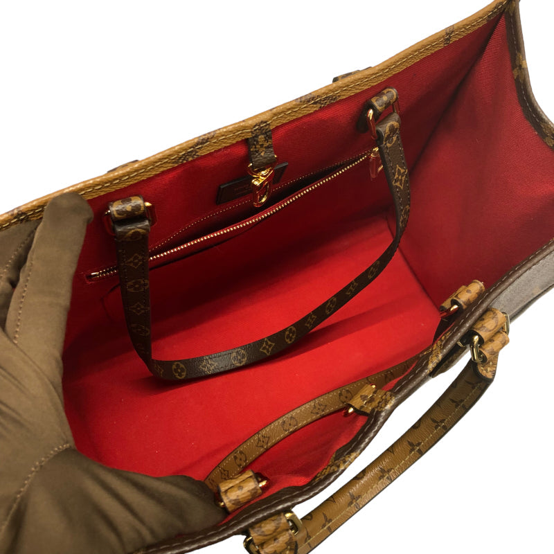 Louis Vuitton On The Go MM Monogram Giant Reverse Handbag