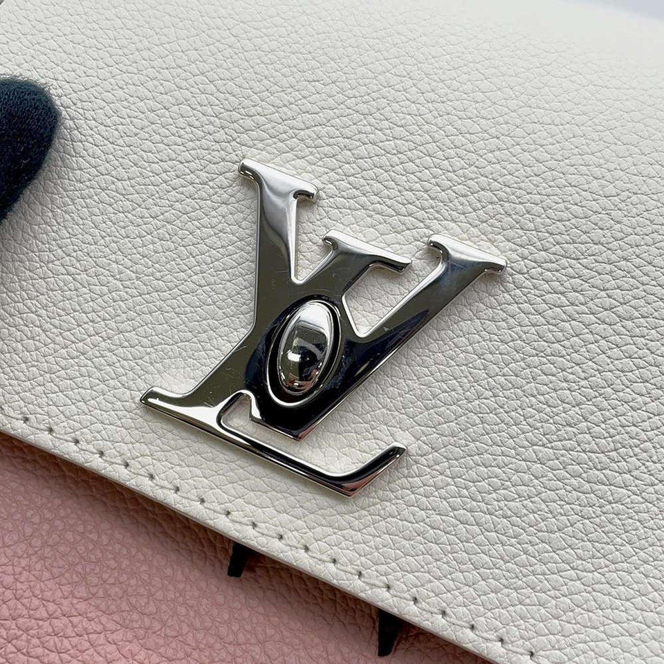 Louis Vuitton Lock Me Mini Leather Silver Hardware Backpack