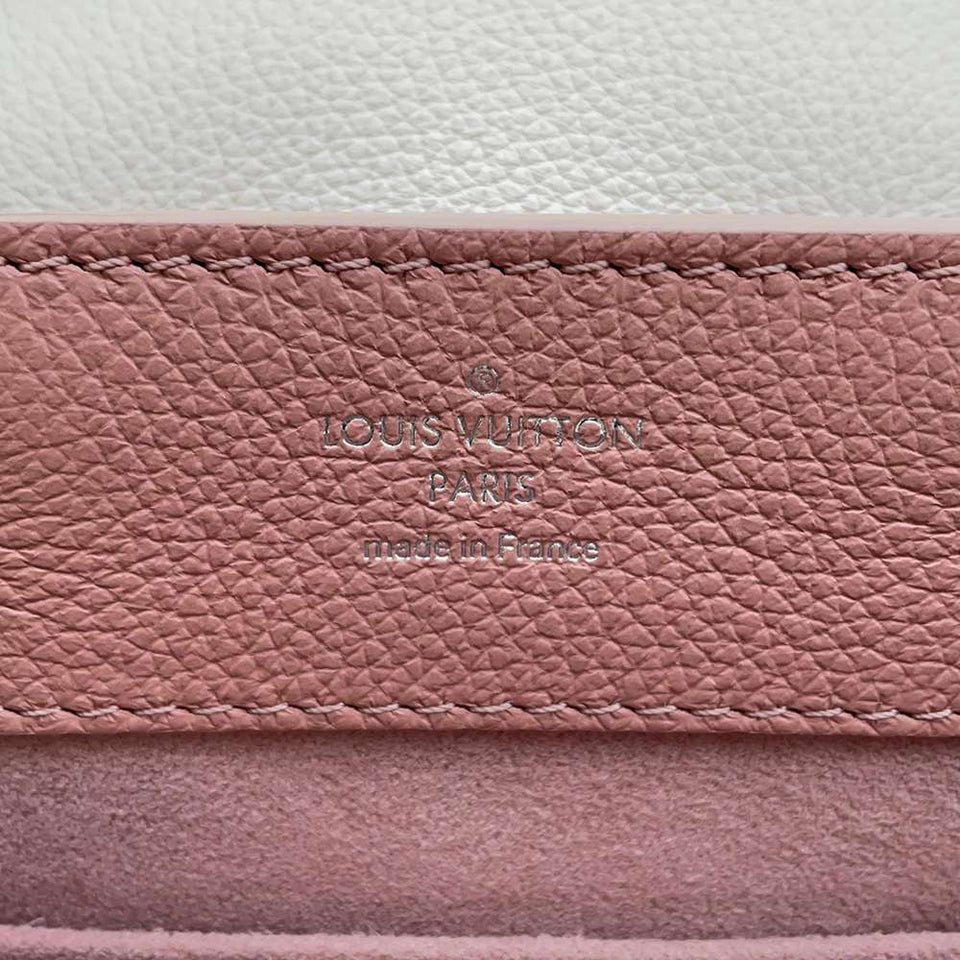 Louis Vuitton Lock Me Mini Leather Silver Hardware Backpack