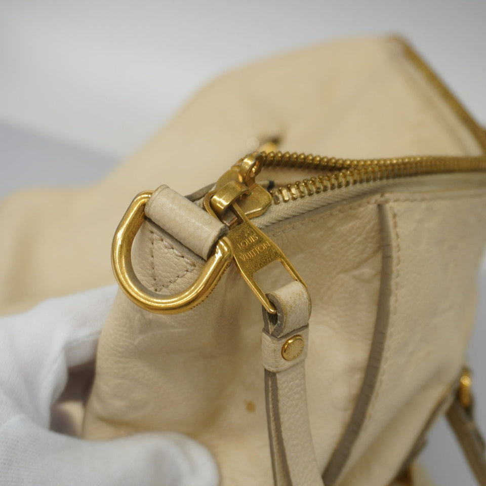 Louis Vuitton Lumineuse PM Empreinte Monogram Emplant Creme